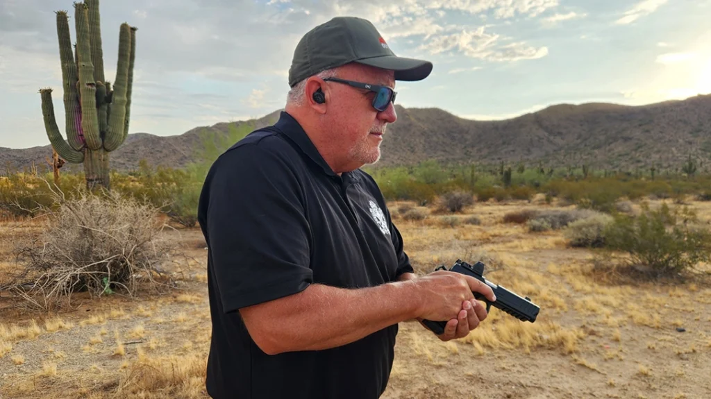 The author running a drill with the new pistol.